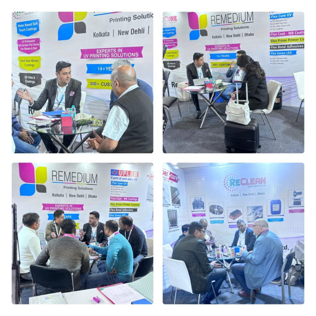 Visitors discussing printing solutions at the Remedium booth during Print Pack India 2025