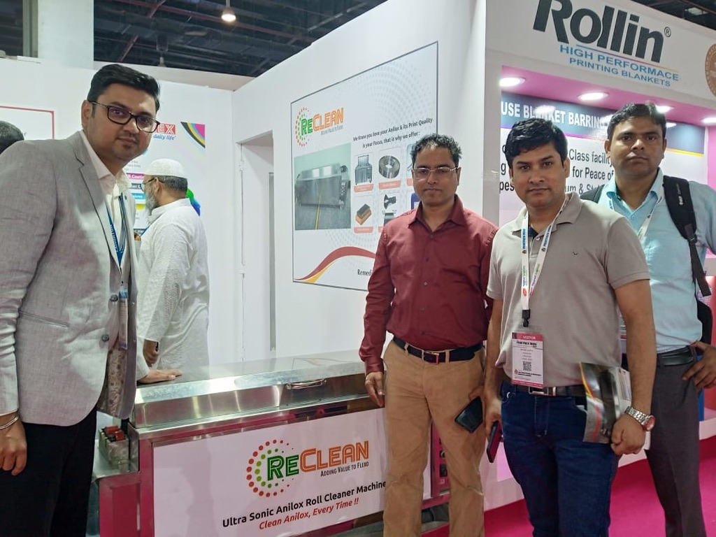 Reclean ultrasonic anilox roll cleaner on display at Print Pack India 2022 with visitors at the stand